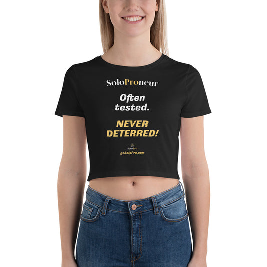 "Often tested. NEVER DETTERED!" - Women’s Crop Tee